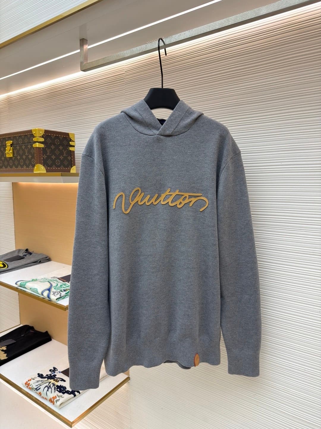L X V Knitted hoodie