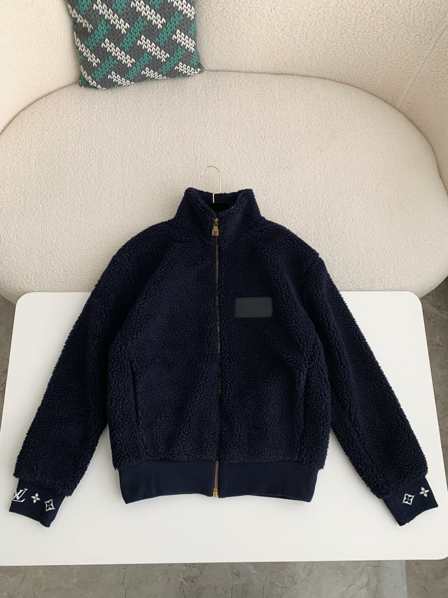 L X V Embossed leather patch long-sleeve fleece jacket