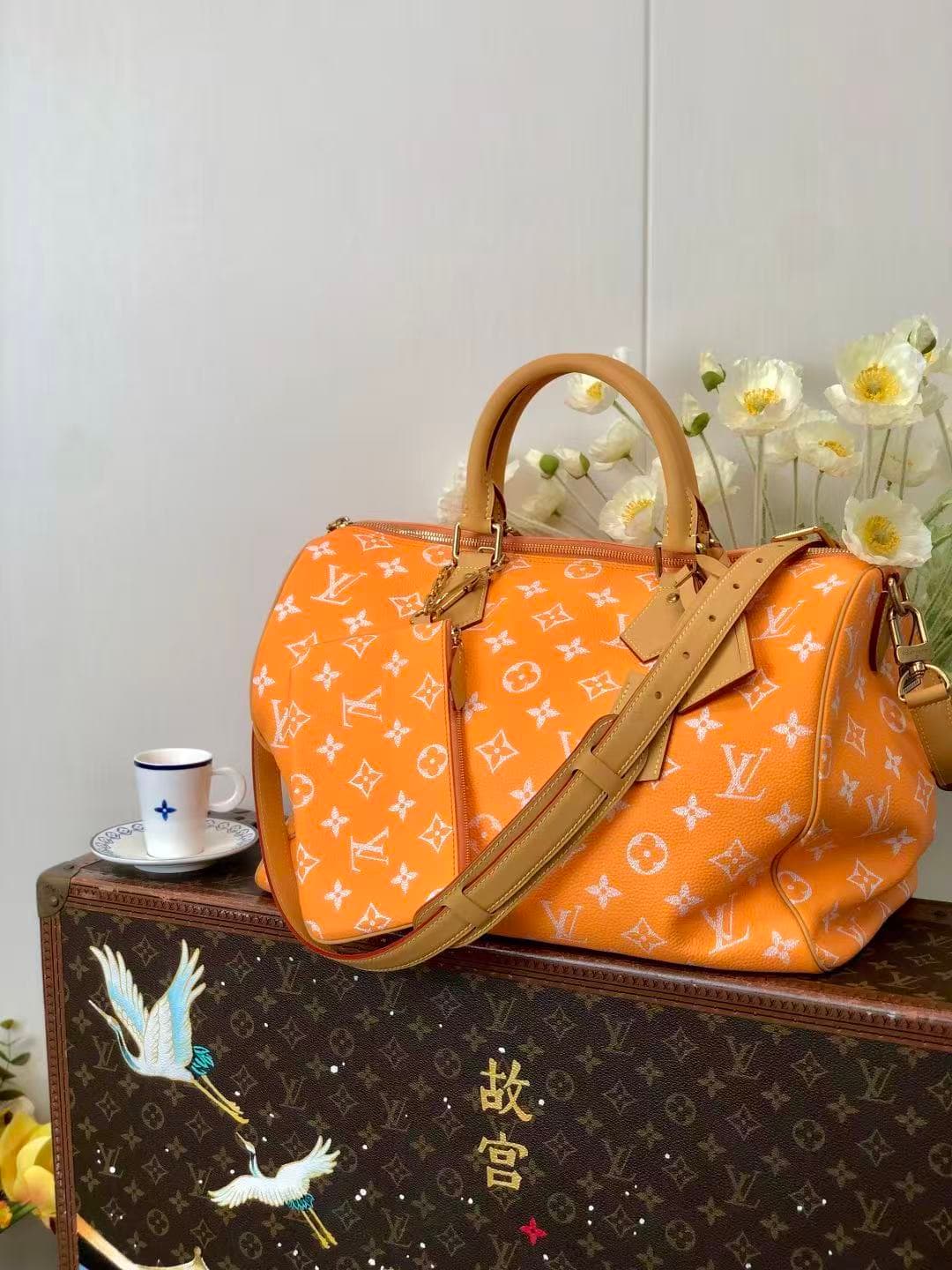 L X V M13919 Speedy P9 bandouliere 40*26*23CM