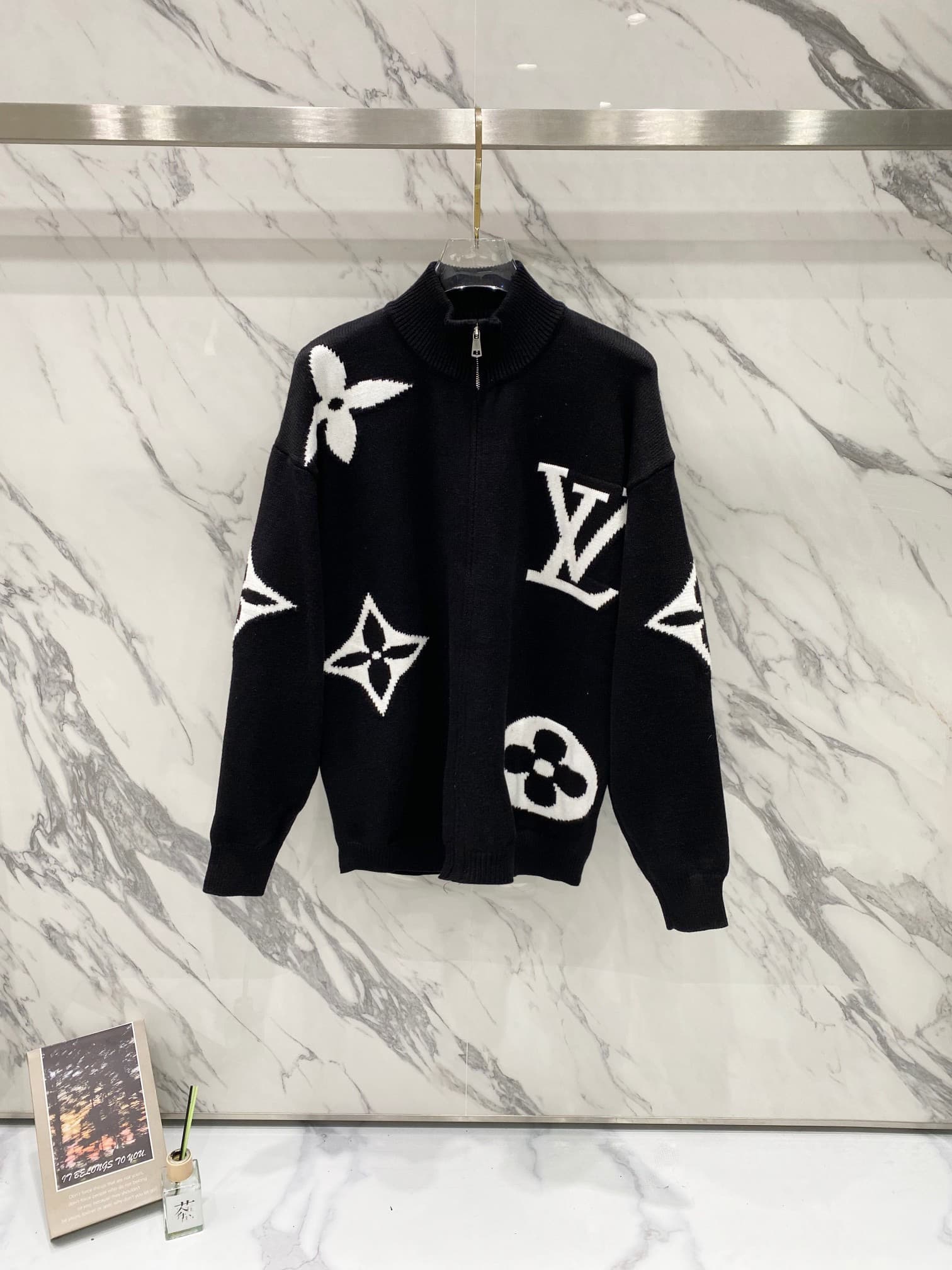 L X V Sweater 2025