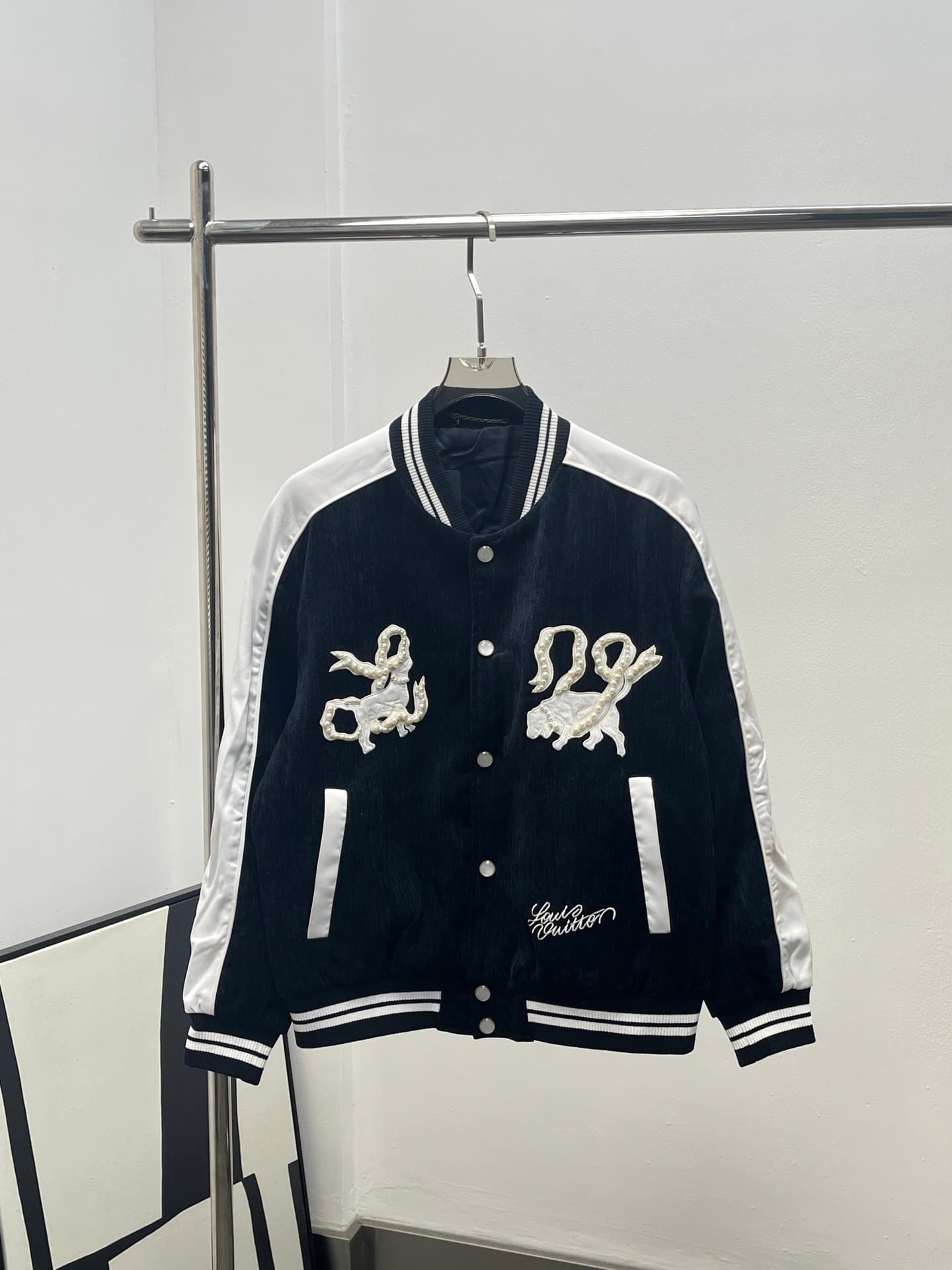 L X V baseball uniform