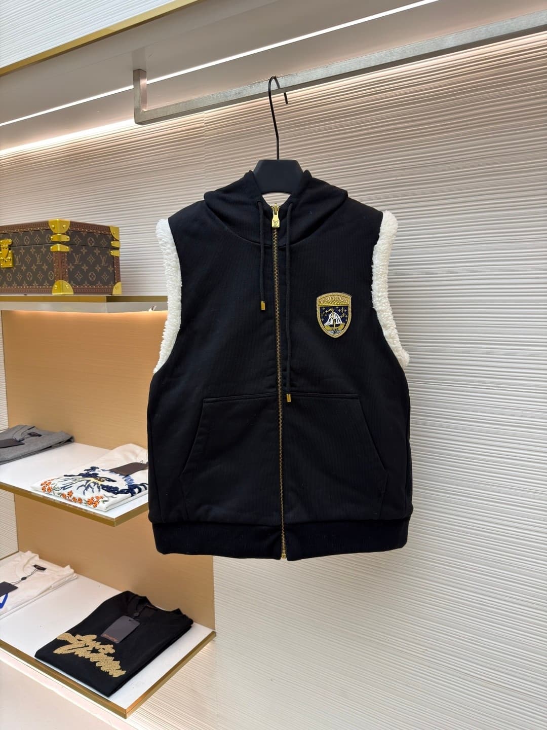 L X V Double-sided hooded vest